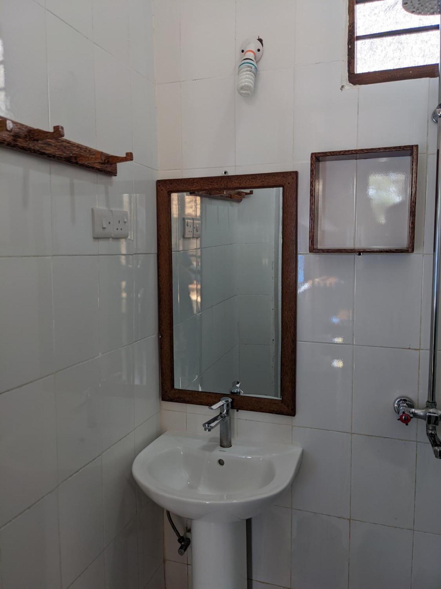 Mkadi Beach House Hotel Nungwi Quarto foto