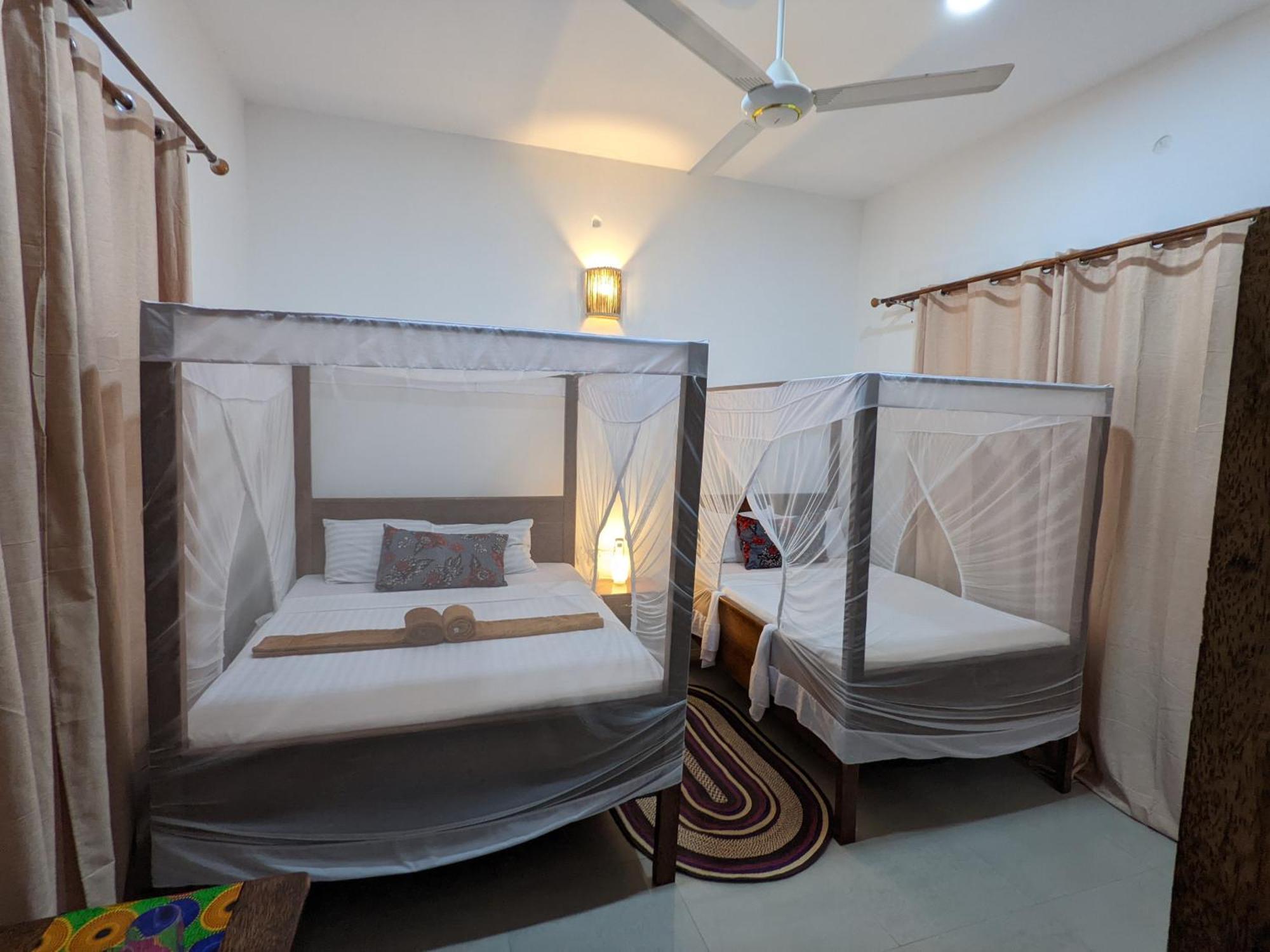 Mkadi Beach House Hotel Nungwi Quarto foto