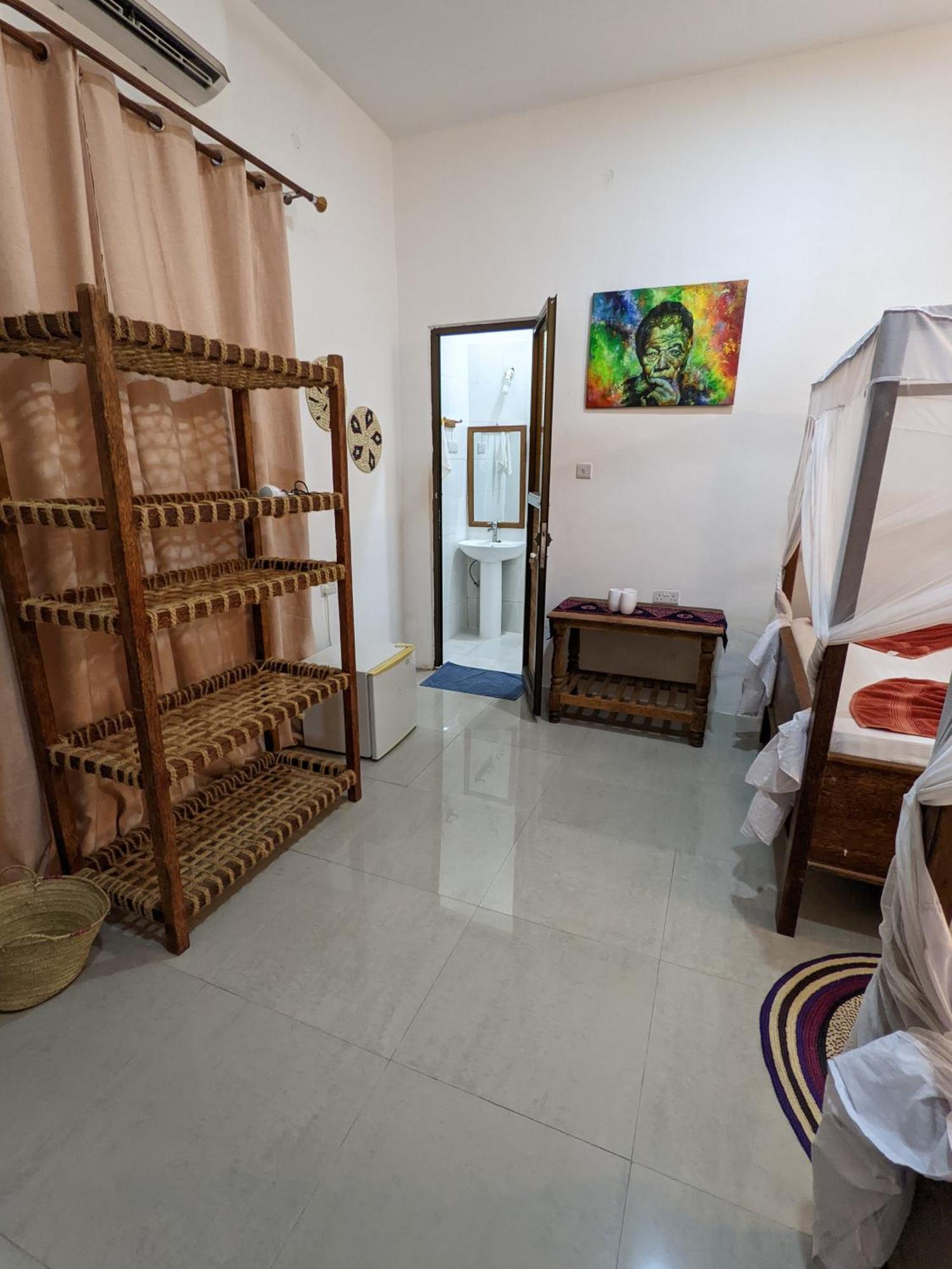 Mkadi Beach House Hotel Nungwi Quarto foto